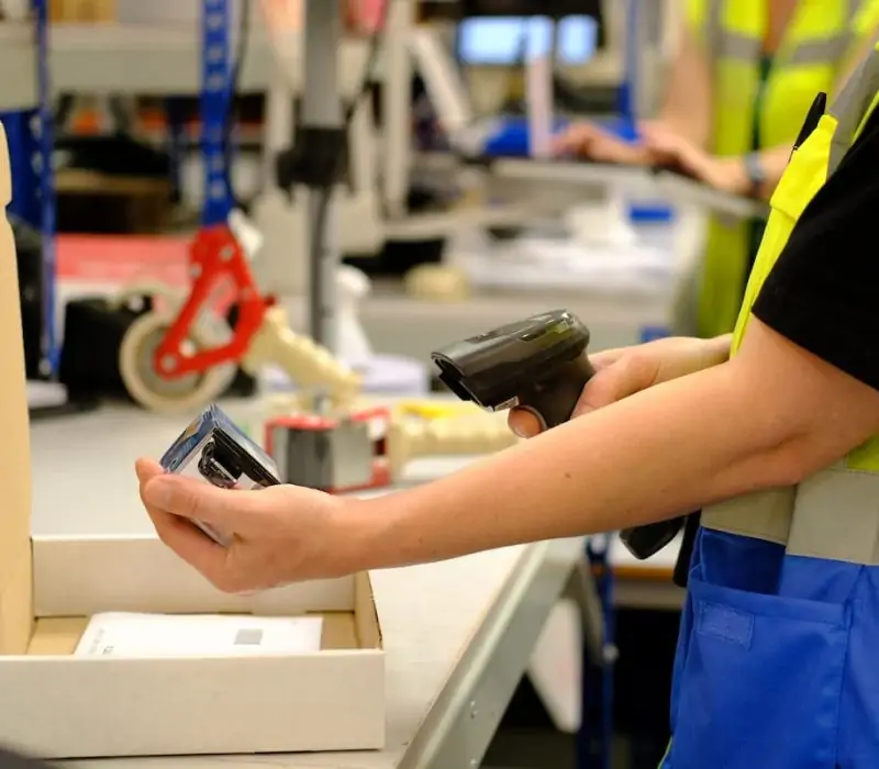 Scanning an item out of the pick and pack warehouse
