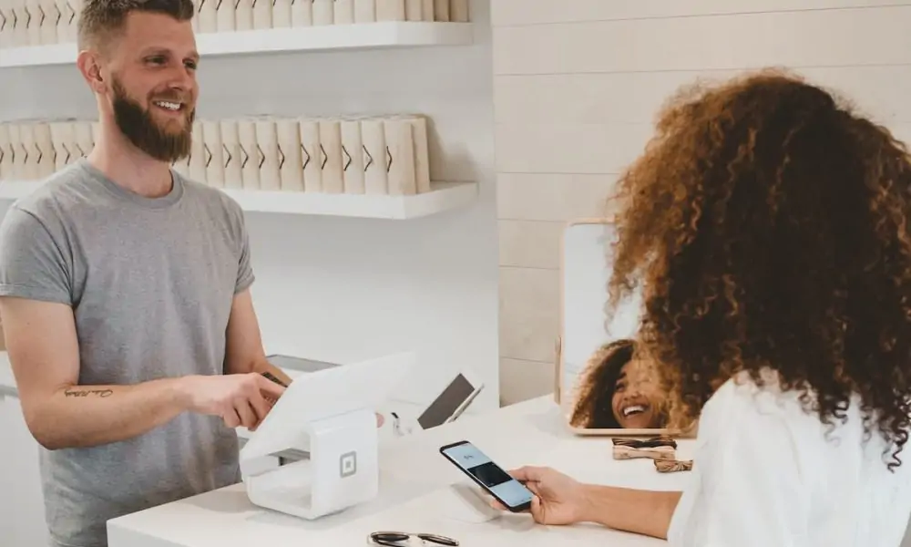 Person buying from a local business